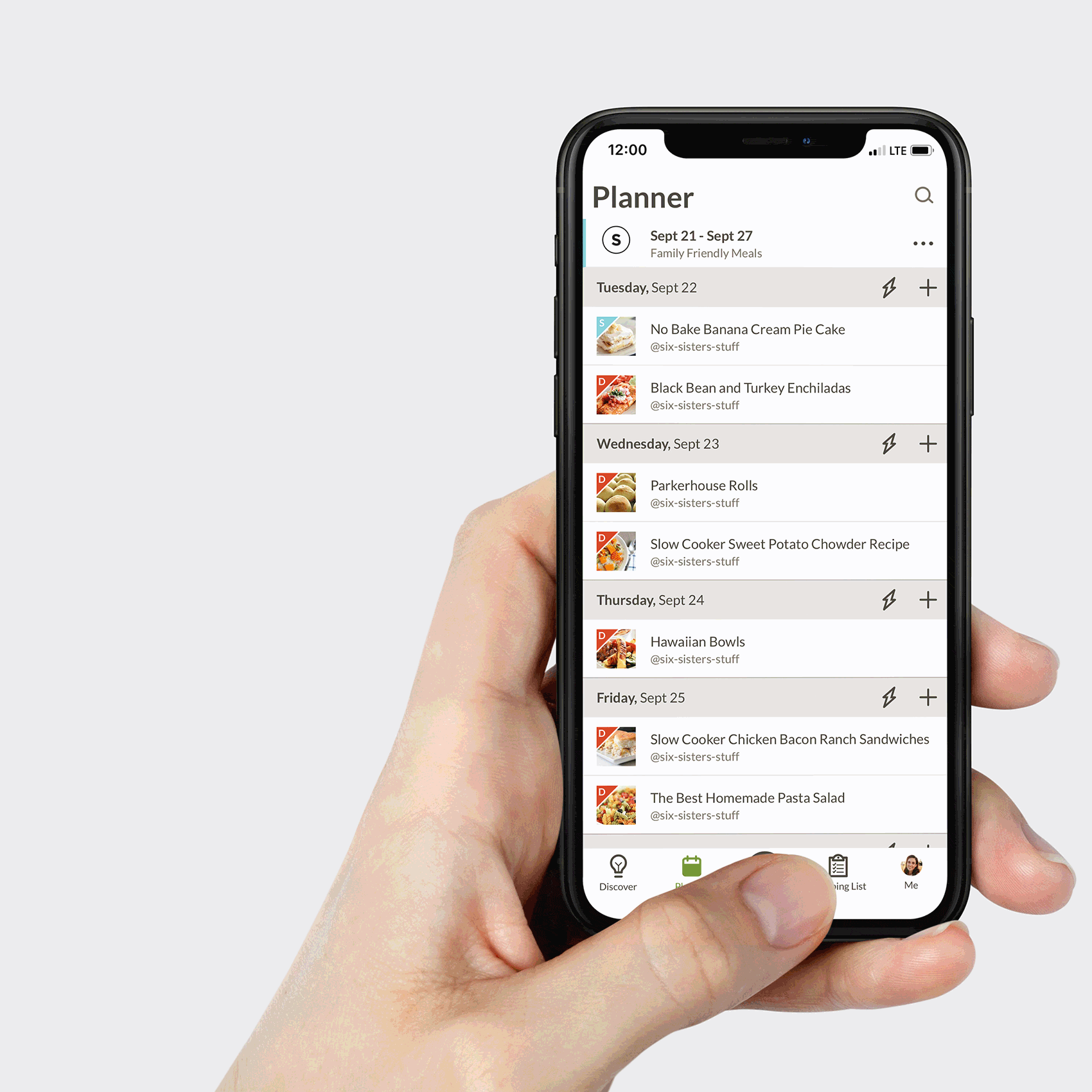hand holding a phone that displays how to use the Prepear app for meal planning and grocery shopping