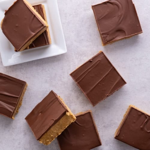 Finished and cut no bake peanut butter bars viewed from the top down on the countertop