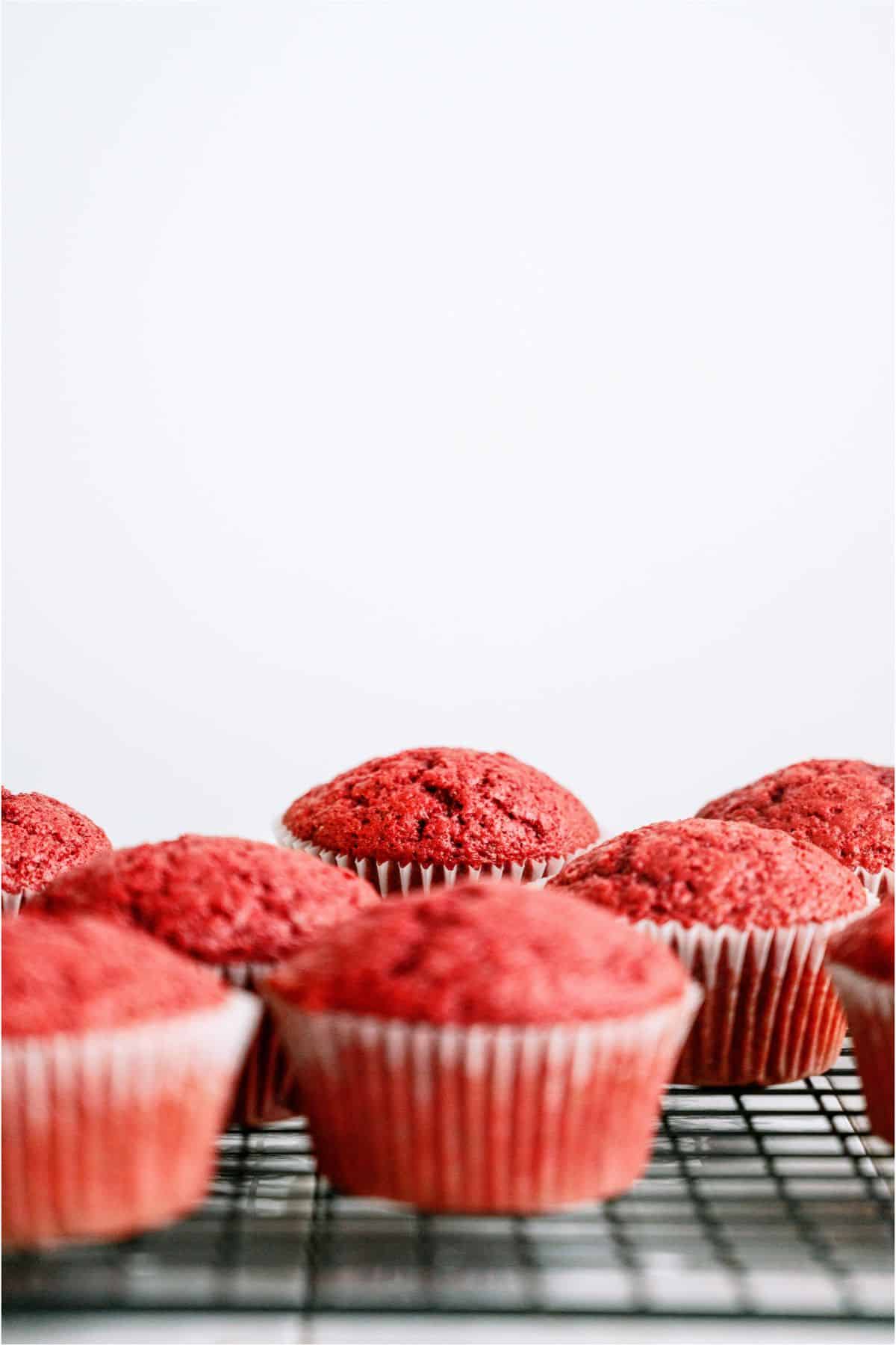 Red Velvet Cupcakes on a cooling rack.