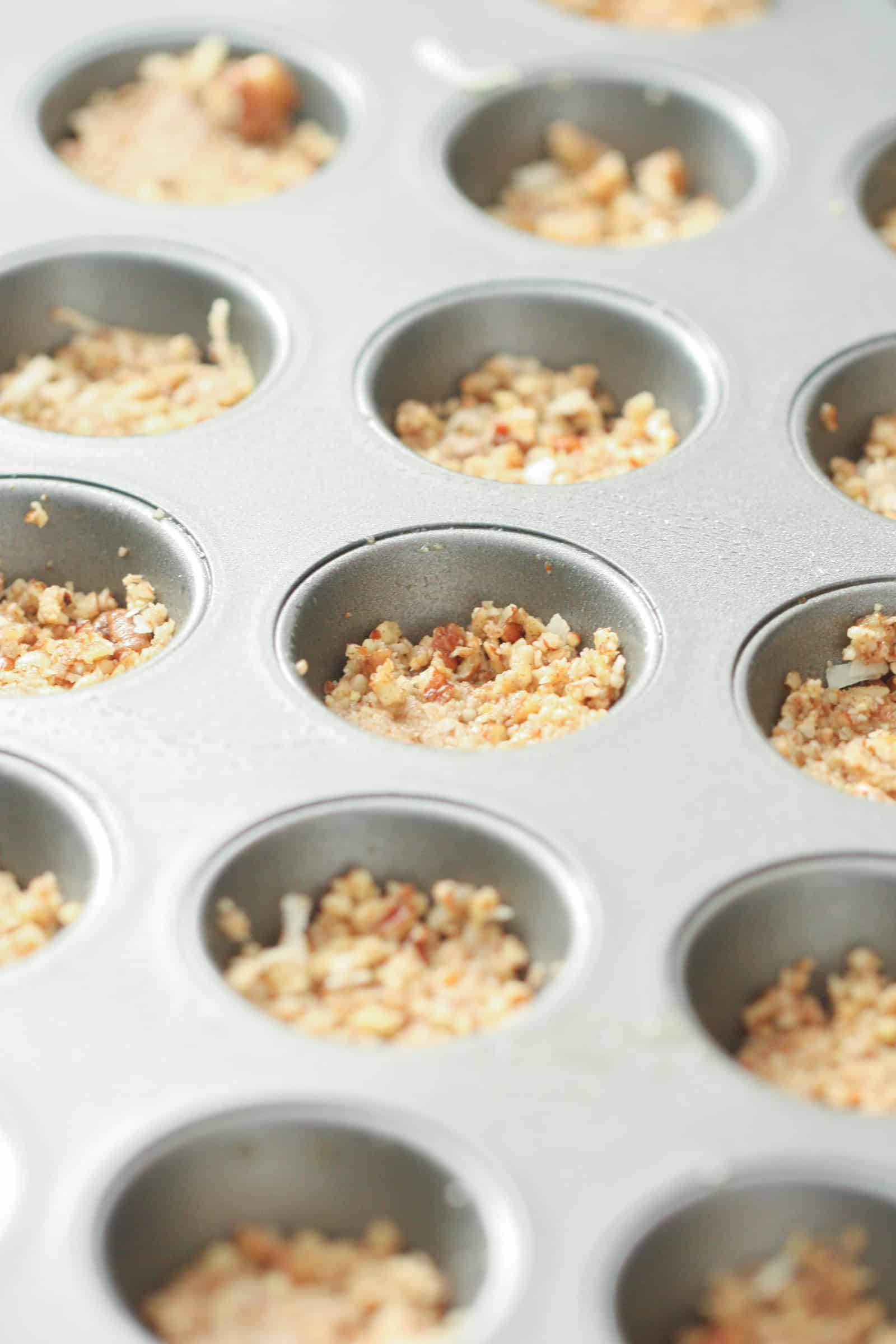 Skinny Frozen Strawberry Bites pecan crust in muffin tin
