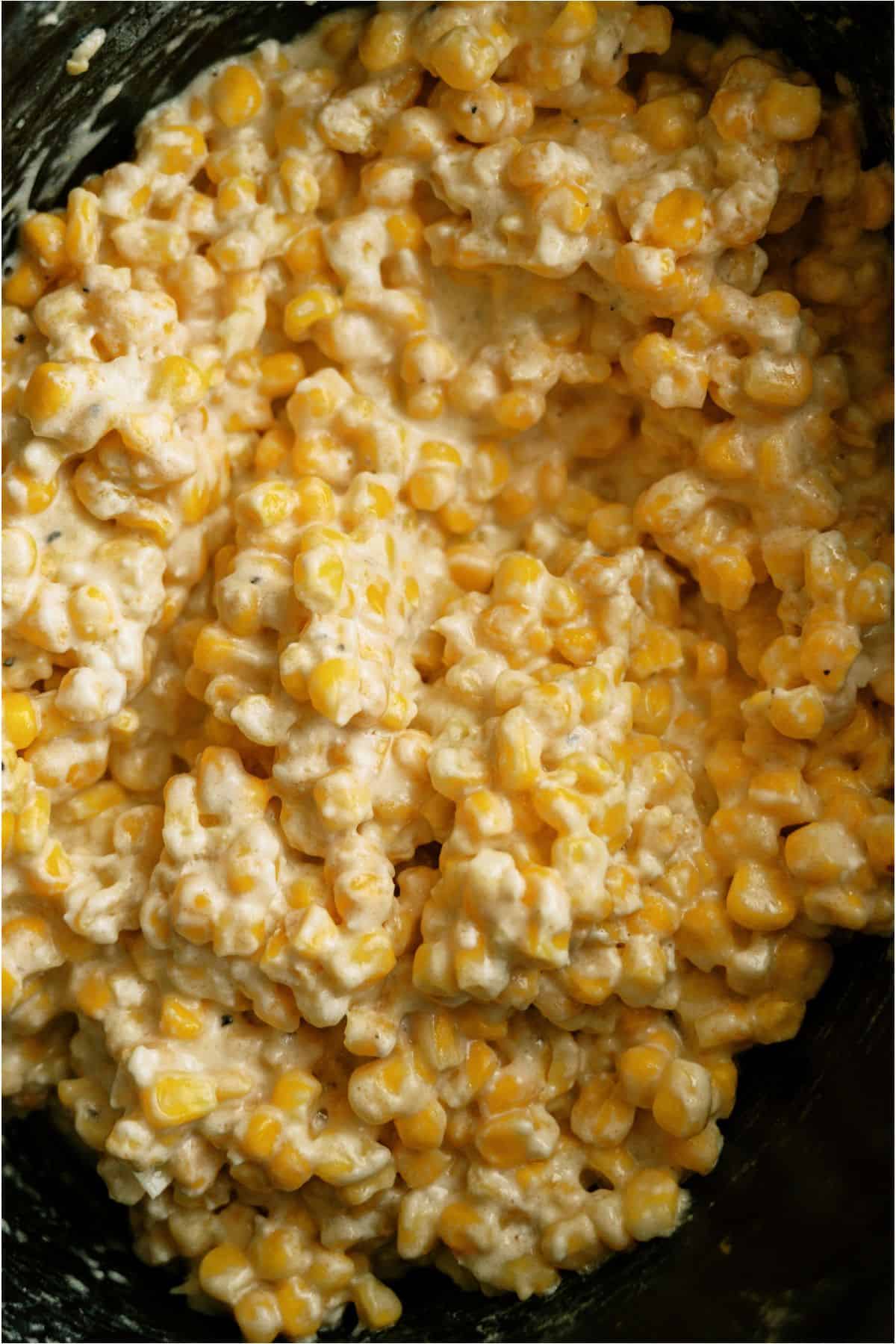 A close up of a bowl of corn.